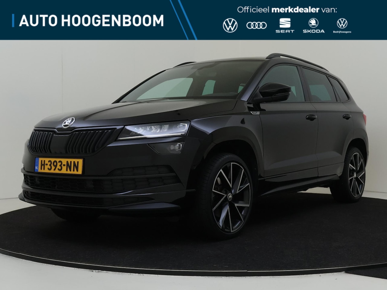 Skoda Karoq - 1.5 TSI ACT Sportline Business | Panoramadak | Achteruitrijcamera | Navigatie | Stoelverwa - AutoWereld.nl