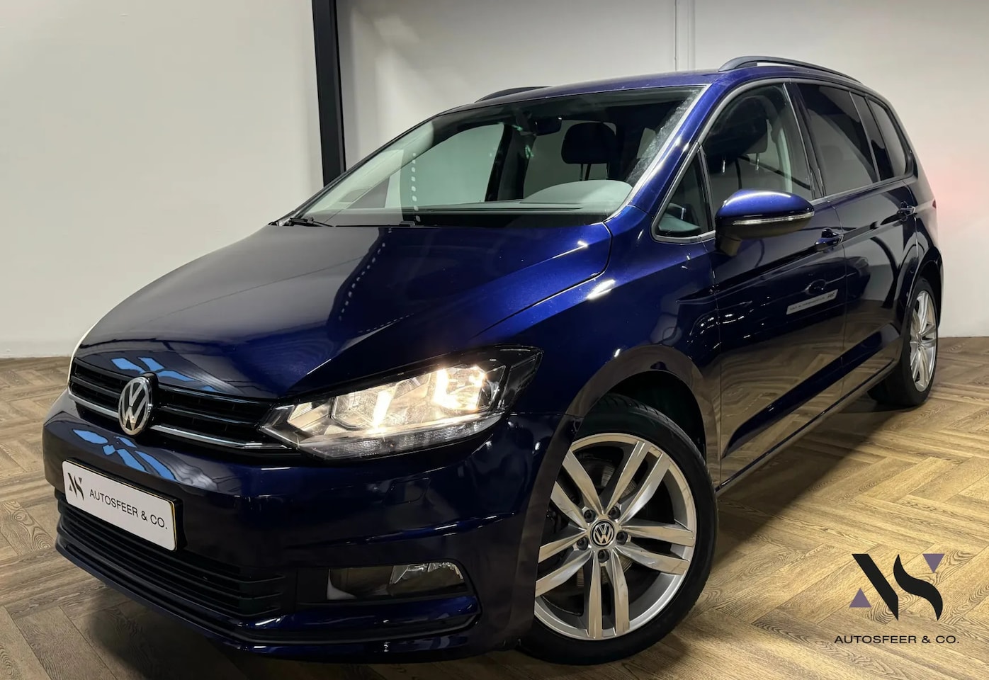 Volkswagen Touran - 1.4 TSI Highline 7p. 1.4 TSI Highline 7persoons - AutoWereld.nl