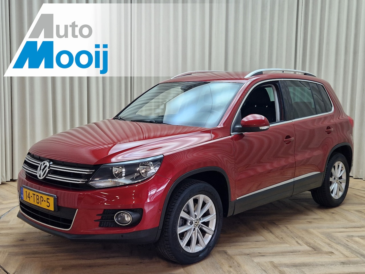 Volkswagen Tiguan - 1.4 TSI Sport&Style *Uitklapbare Trekhaak* Navigatie / Cruise / Airco / PDC V&A / 17'' LMV - AutoWereld.nl