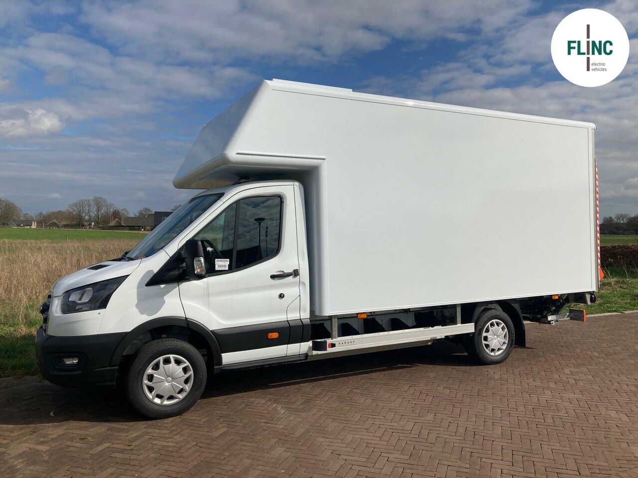 Ford E-Transit - 425 L4H1 + Karhof laadbak dHollandia laadklep - AutoWereld.nl