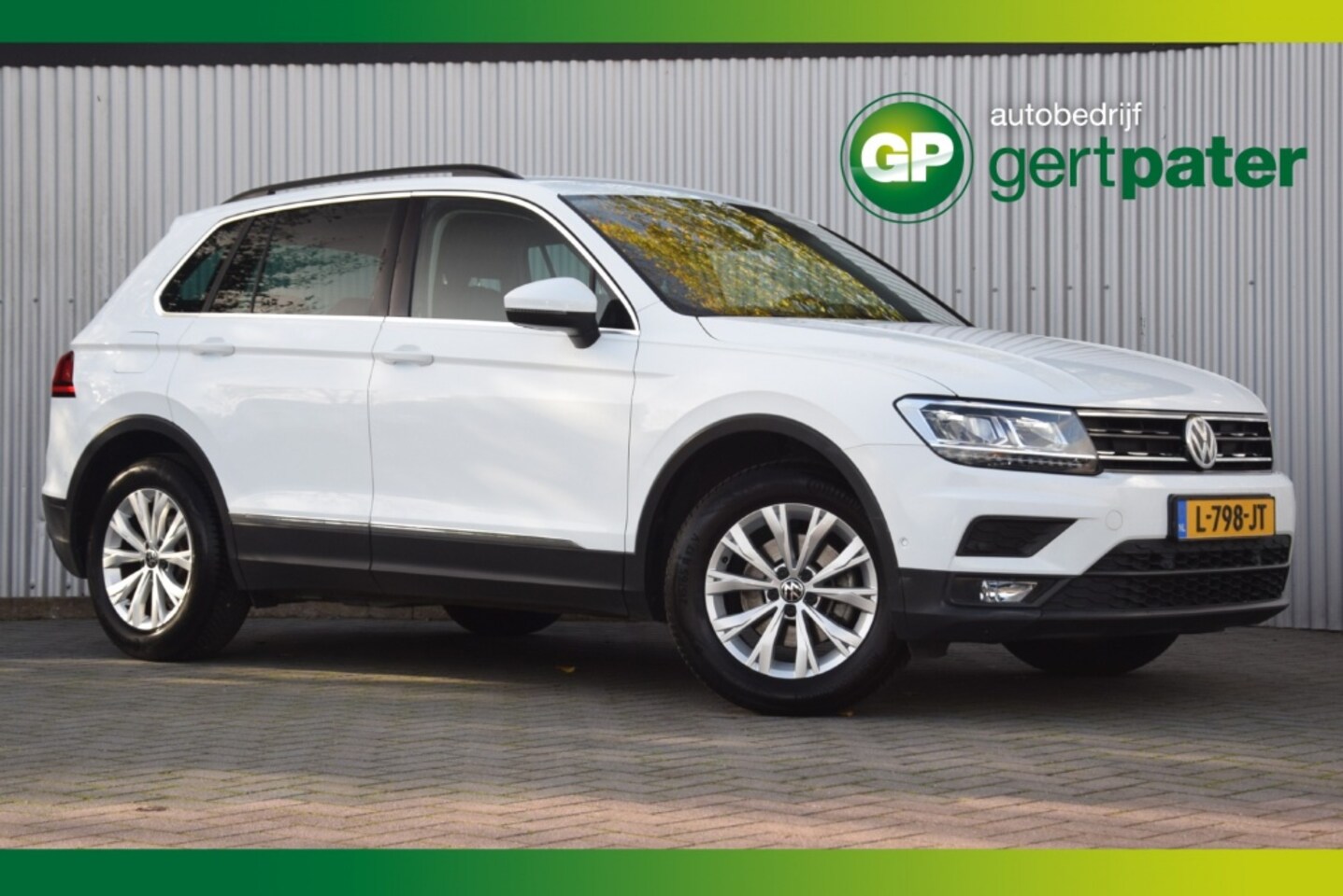 Volkswagen Tiguan - 1.5TSI ACT Comfortline Trekhaak/ParkAssist/Camera/LED/Keyless - AutoWereld.nl