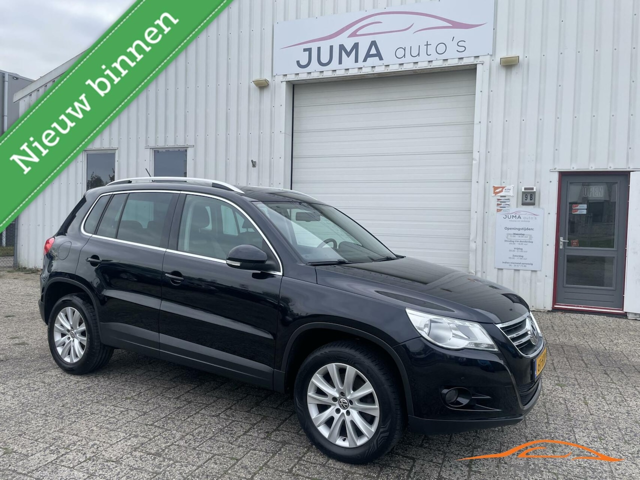 Volkswagen Tiguan - 1.4 TSI Sport&Style 4Motion, 2e eigenaar , Airco - AutoWereld.nl