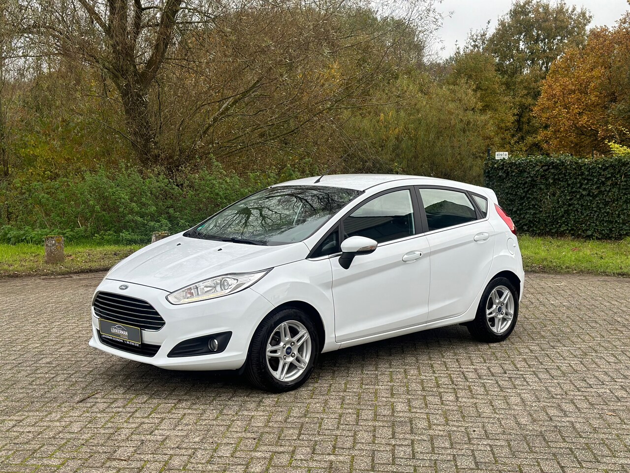 Ford Fiesta - 1.0 EcoBoost Titanium DEALER AUTO I NAVI I PDC I NWE APK I MOOI - AutoWereld.nl