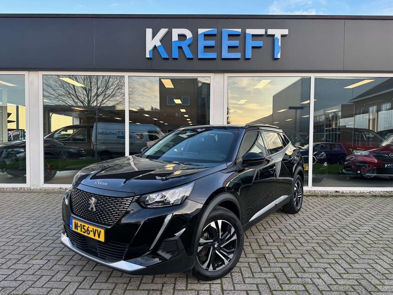 Peugeot 2008 - 1.2 PureTech Allure Pack Camera | Navi | APP - AutoWereld.nl