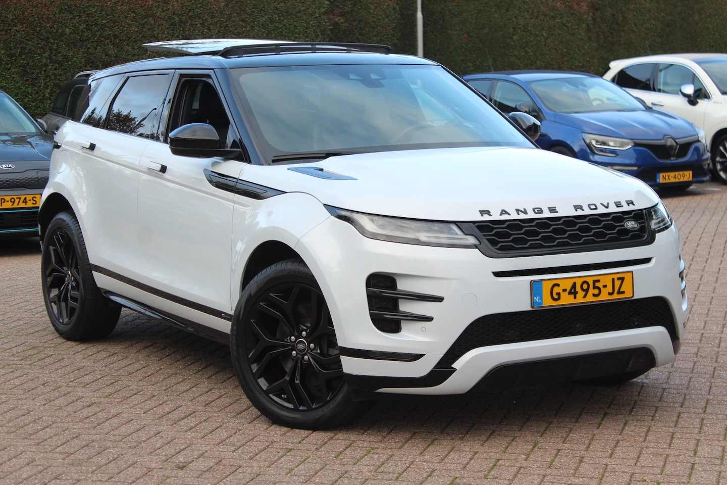 Land Rover Range Rover Evoque - 2.0 D150 AWD SE R-Dynamic / Trekhaak / Panoramadak / Camera / Leder / Keyless / Meridian / - AutoWereld.nl