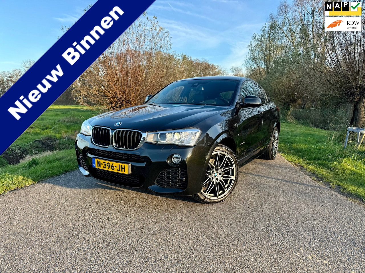 BMW X4 - XDrive20i High Executive xLine Edition / Automaat / Head-up Display / 20"LM Velgen / Navig - AutoWereld.nl