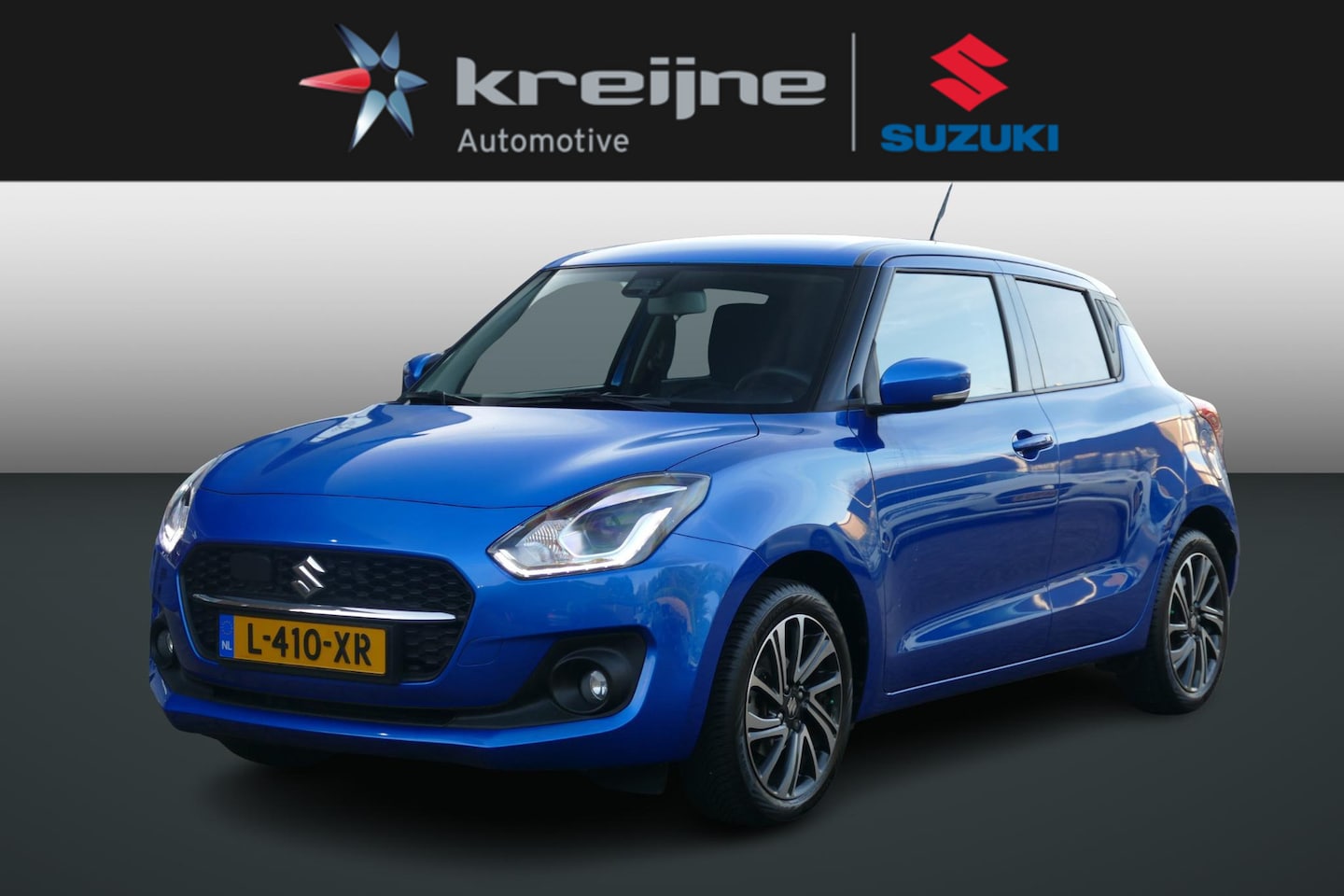 Suzuki Swift - 1.2 Style Smart Hybrid | ALL SEASON BANDEN | - AutoWereld.nl