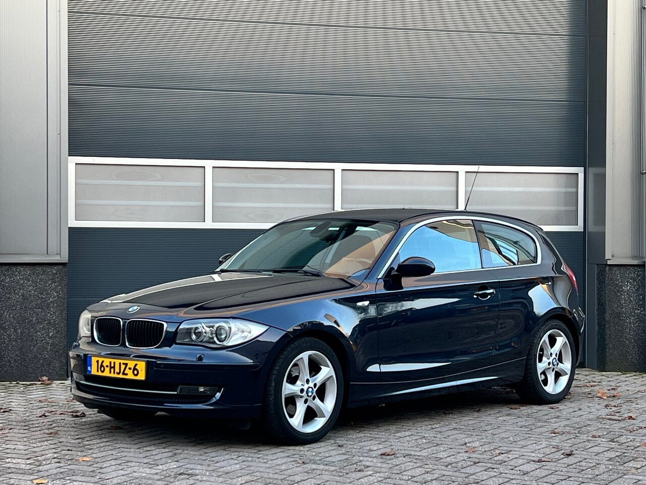 BMW 1-serie - 116i High Executive bj.2009 Autom|Clima|Cc|Boekjes. - AutoWereld.nl