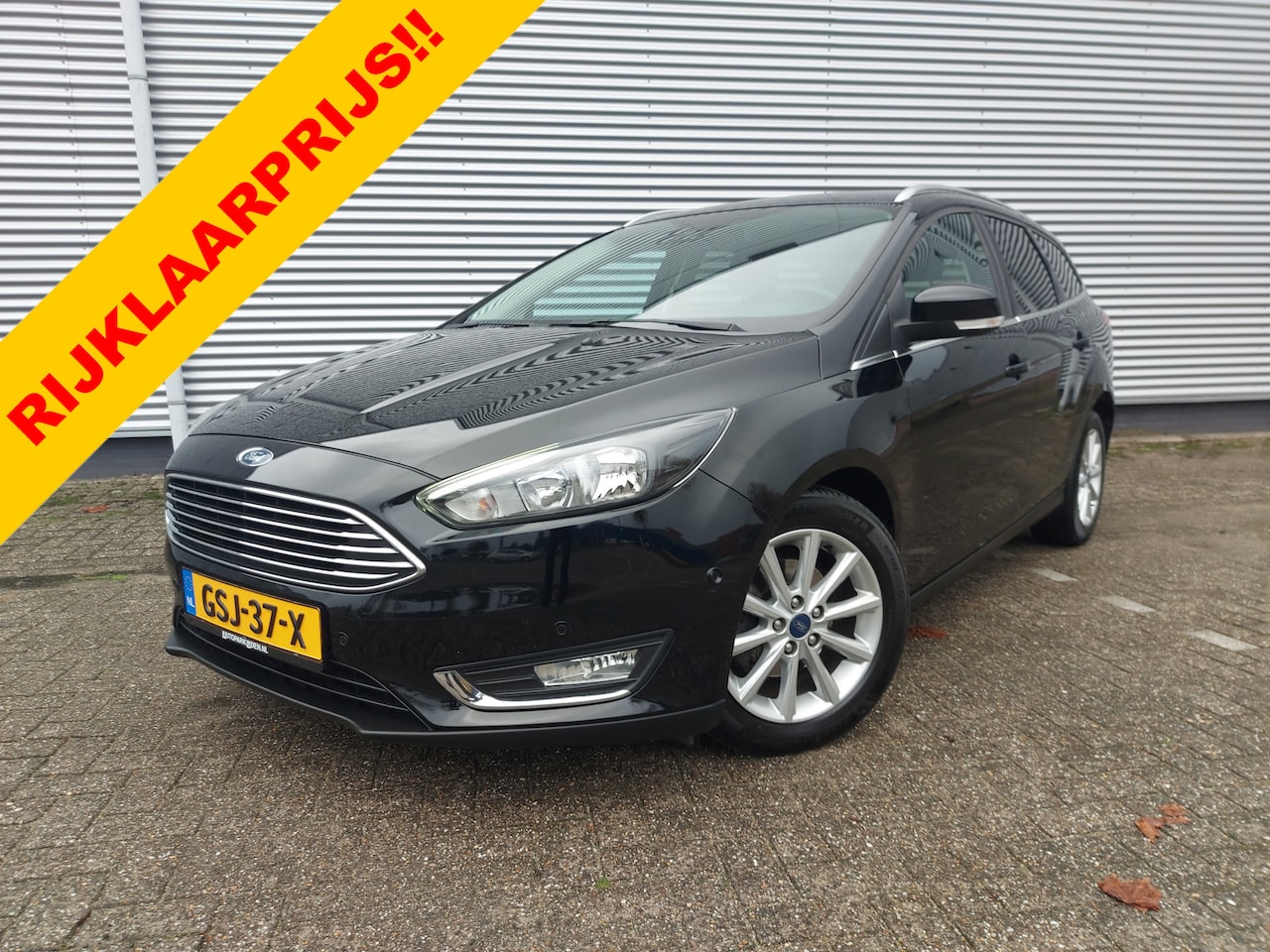 Ford Focus Wagon - 1.0 Titanium 1.0 Titanium, airco,cruise,navigatie/achteruitrijcamera,stoel/stuurverwarming,parkeersenso - AutoWereld.nl