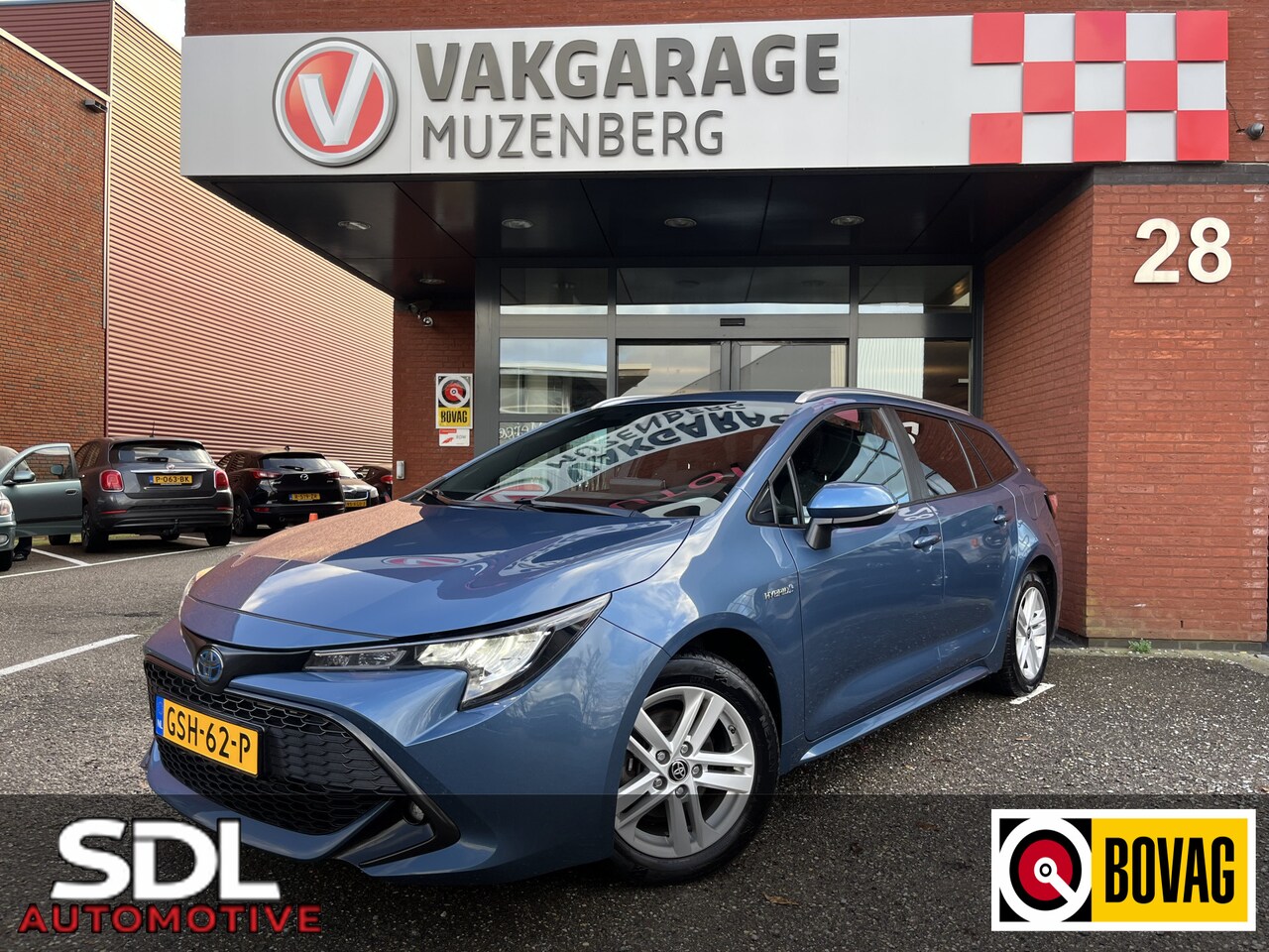 Toyota Corolla Touring Sports - 1.8 Hybrid Dynamic // FULL LED // CAMERA // STOEL & STUURVERWARMING // APPLE CARPLAY / AND - AutoWereld.nl