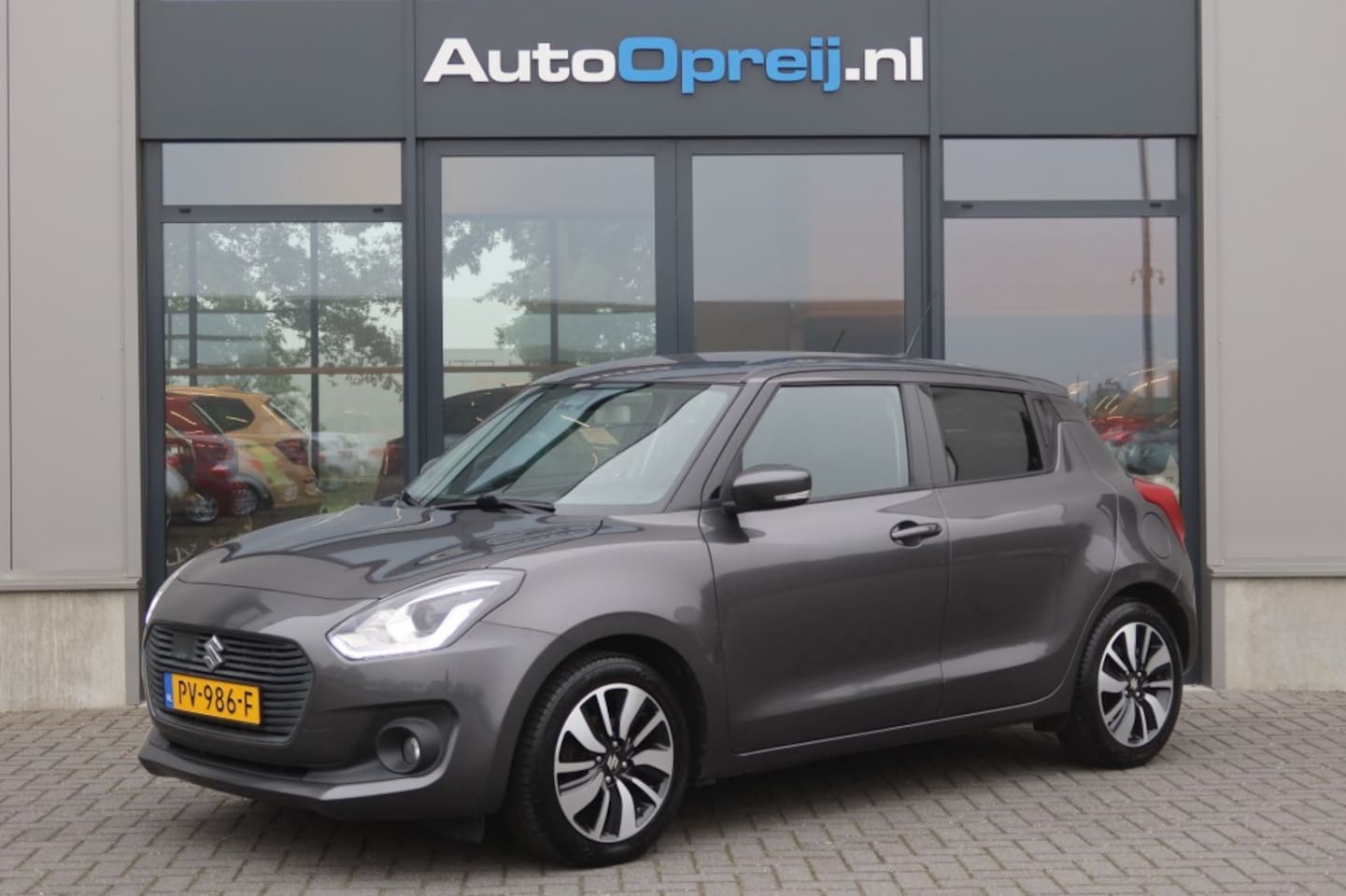 Suzuki Swift - 1.2 Stijl Smart Hybrid NAVI, Clima, Cruise, PDC, Trekhaak afnb. - AutoWereld.nl