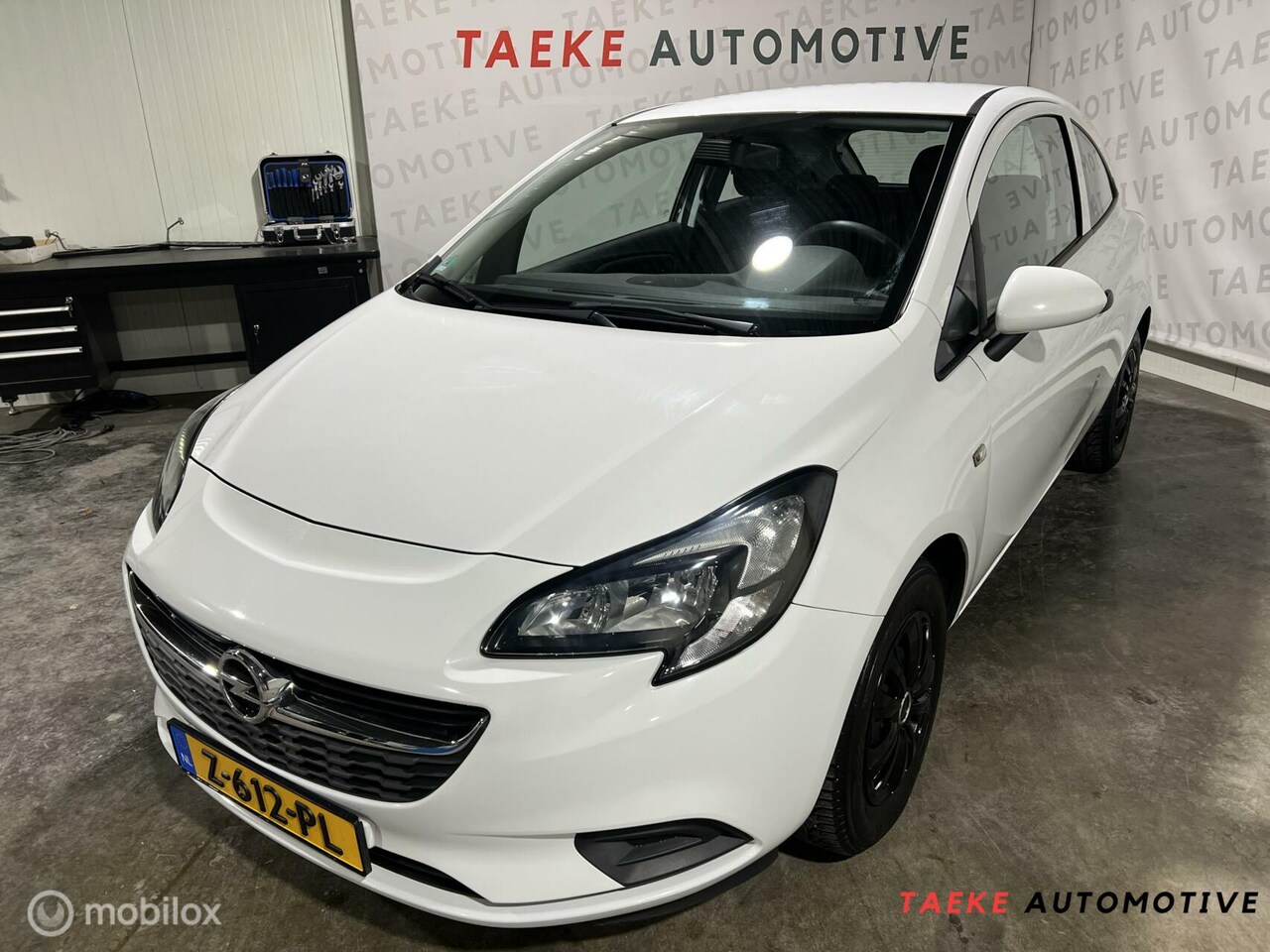 Opel Corsa - 1.2 netjes/airco - AutoWereld.nl