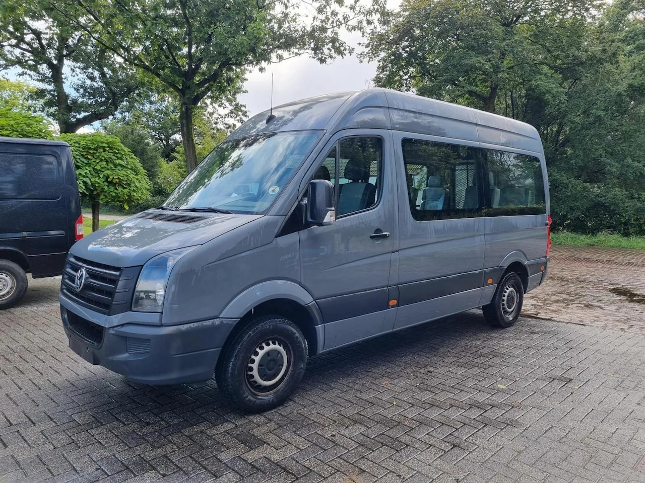 Volkswagen Crafter - 2.0 TDI 9 Pers rolstoellift - AutoWereld.nl