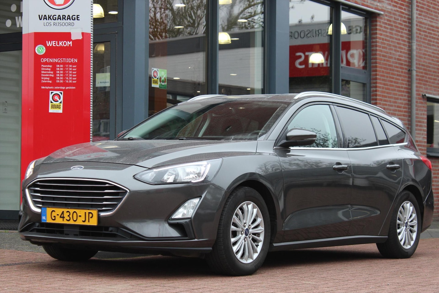 Ford Focus Wagon - 1.0 EcoBoost *Titanium* | Trekhaak | Carplay | Navigatie | A/C | Cruise Control | Orig. NL - AutoWereld.nl