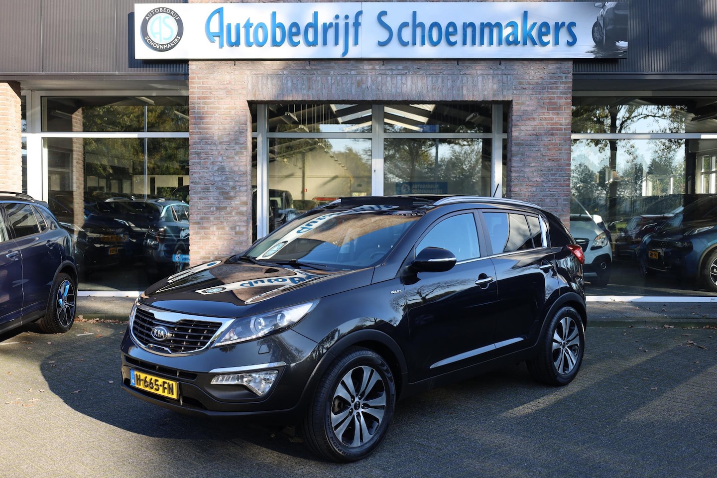 Kia Sportage - 2.0 X-clusive 4wd TREKHAAK PANO NAVI CAMERA CRUISE LEDER STOELVERW PDC 4xSTOELVERW 18"LMV - AutoWereld.nl