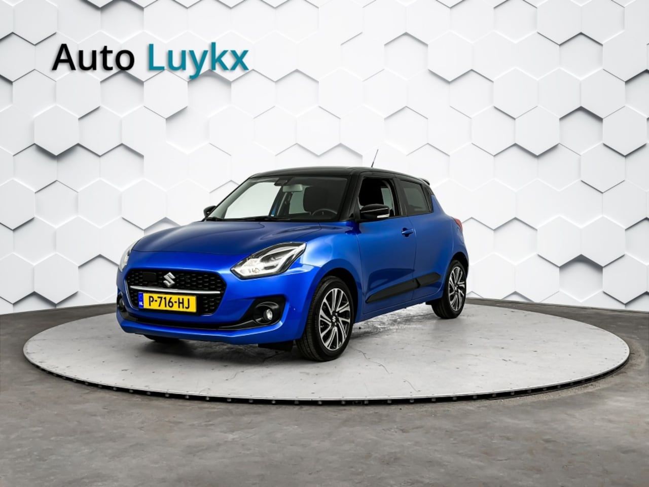 Suzuki Swift - 1.2 Style Smart Hybrid | Navigatie | Climate Control | Adaptieve Cruise Control - AutoWereld.nl