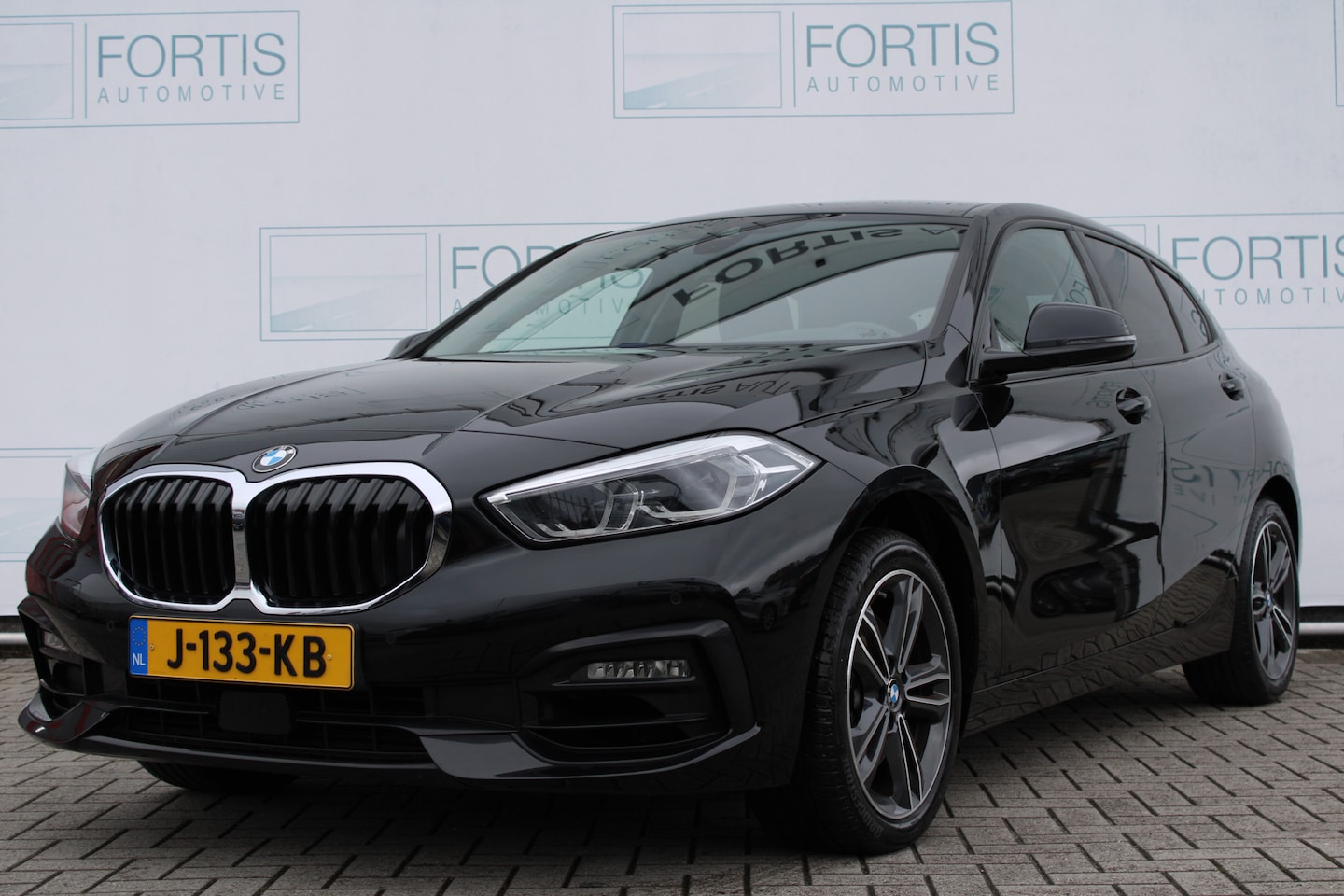 BMW 1-serie - 118i Executive Sport NL AUTO | HALF LEDER | SPORTSTOELEN | CARPLAY | - AutoWereld.nl