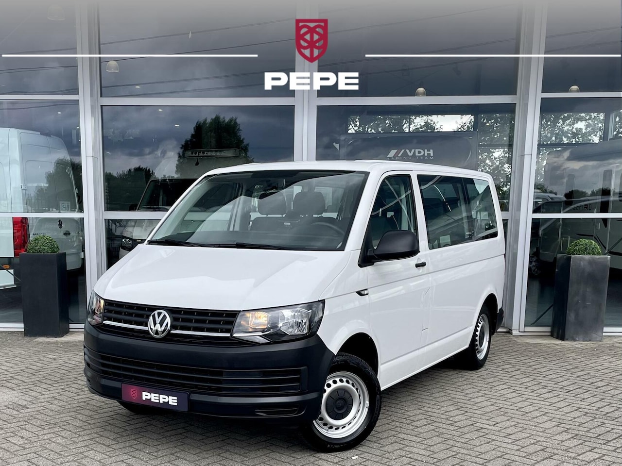 Volkswagen Transporter - 2.0 TSI 150PK L1H1|BENZINE|AIRCO|9-PERSOONS - AutoWereld.nl