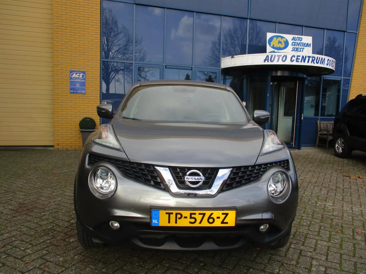 Nissan Juke - 1.6 Acenta Automaat - AutoWereld.nl