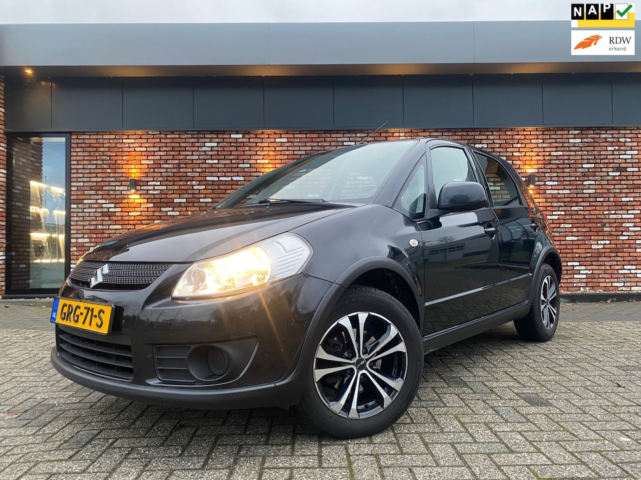 Suzuki SX4 - 1.5 Comfort Airco Hoge Instap 16inch Nw Apk! - AutoWereld.nl