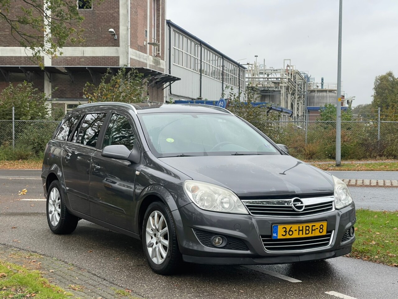 Opel Astra Wagon - 1.6 Temptation | Trekhaak | Navigatie | Airco | Cruise Control - AutoWereld.nl