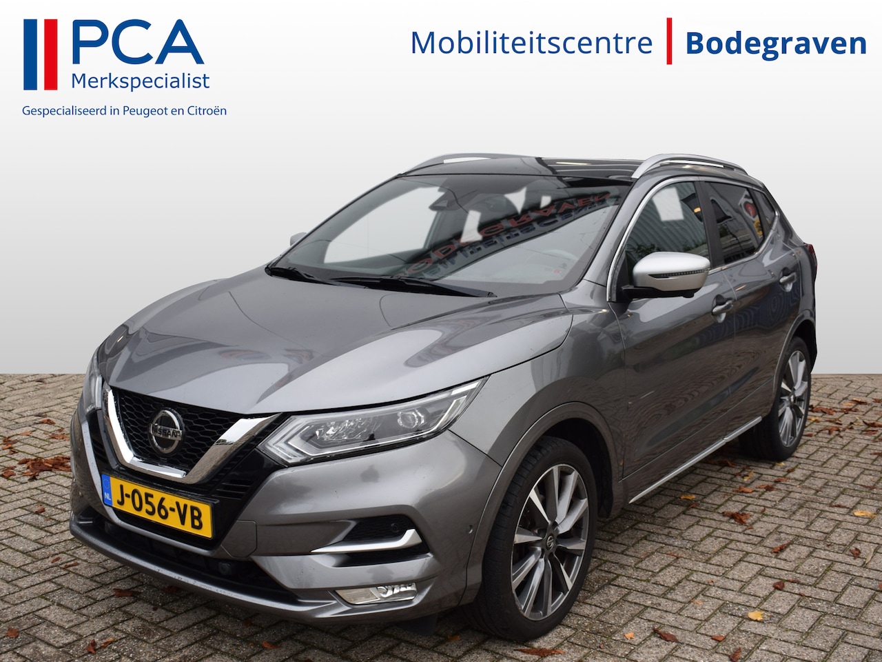 Nissan Qashqai - 1.3 DIG-T Tekna + | Leder | Adaptive Cruise Control | Panoramadak | Voorruitverwarming - AutoWereld.nl