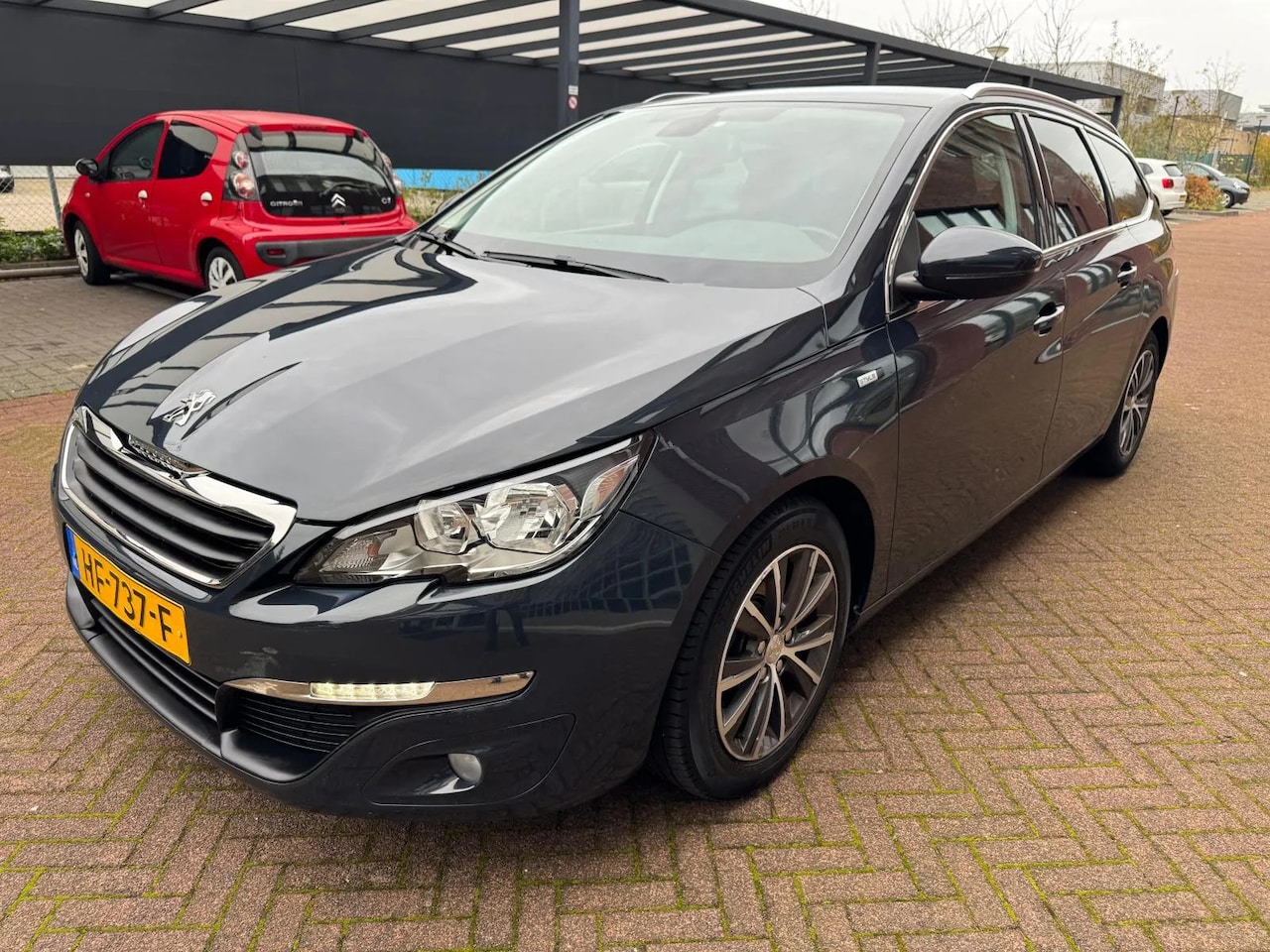 Peugeot 308 SW - 1.2 PureTech Style / Navi / PDC / Trekhaak / LED - AutoWereld.nl