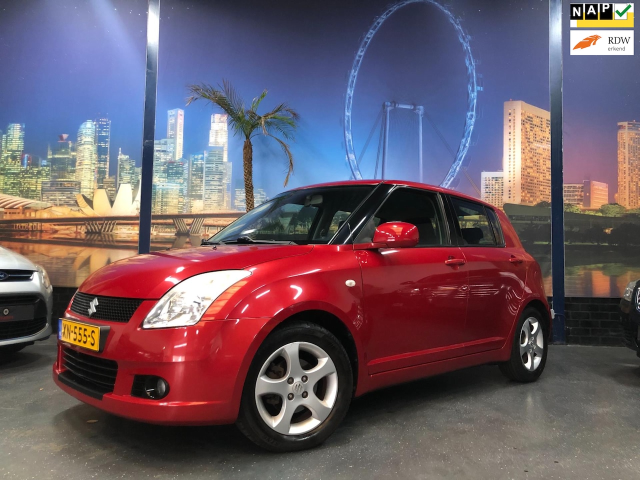 Suzuki Swift - 1.3 GA 93pk/ 5 DRS/ STOELVERW./ AC - AutoWereld.nl