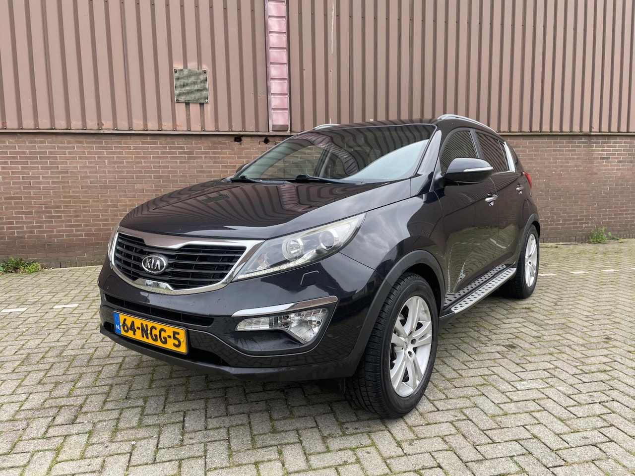 Kia Sportage - 2.0 X-clusive Navi Clima Cruise Camera - AutoWereld.nl