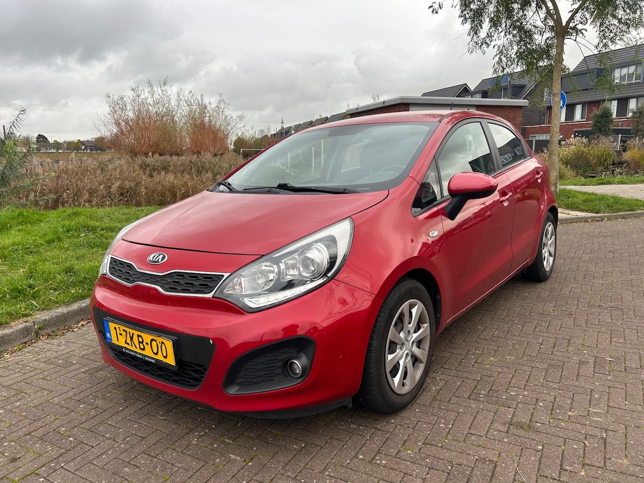 Kia Rio - 1.2 CVVT BusinessLine 5drs Airco Cruise C. - AutoWereld.nl