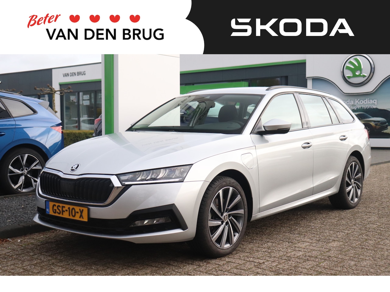 Skoda Octavia Combi - 1.4 TSI iV PHEV 204pk Business Edition | 1.500kg trekgewicht | Parkeersensoren | 18" licht - AutoWereld.nl