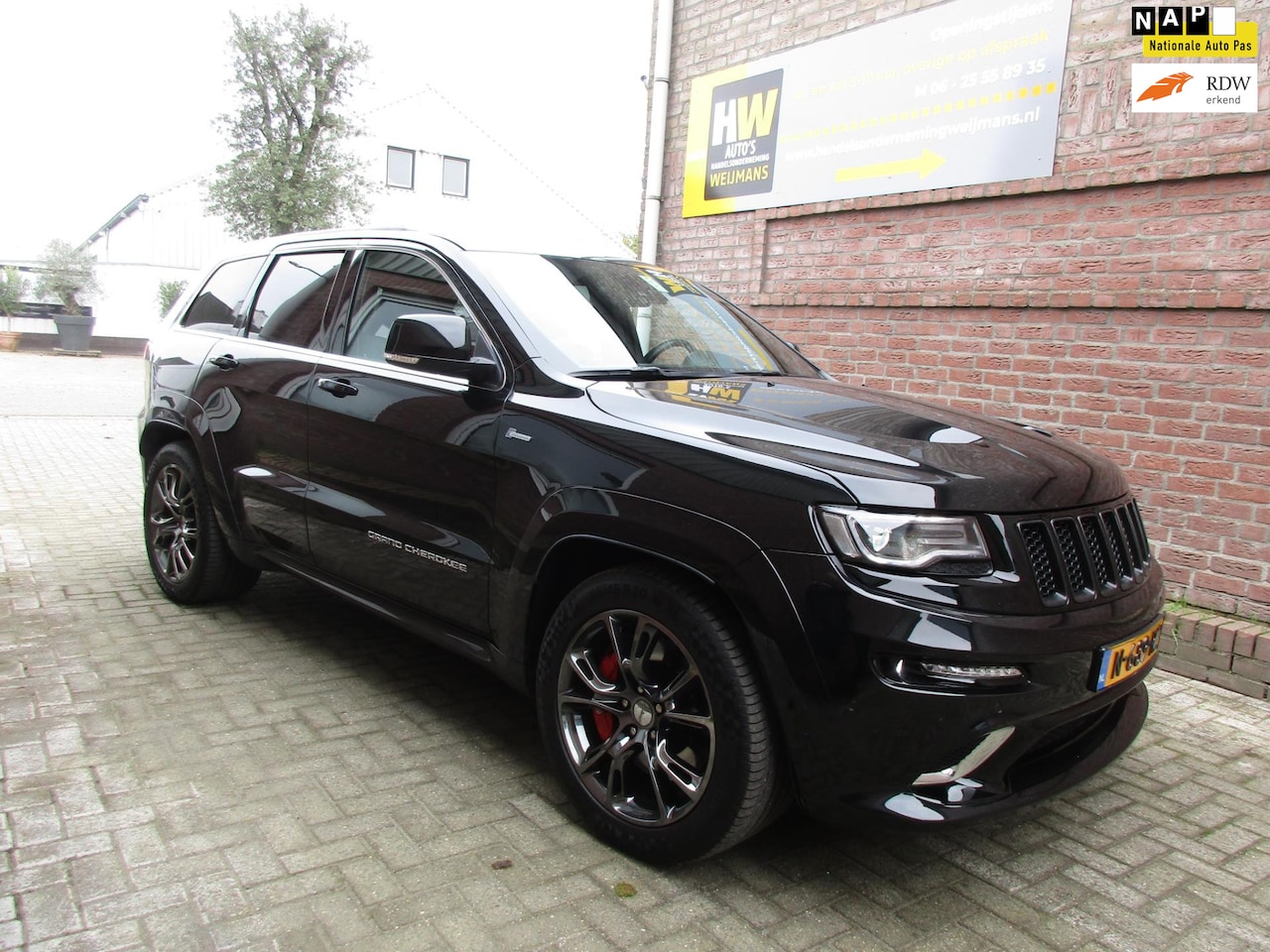 Jeep Grand Cherokee - 6.4 Hemi SRT Automaat, LPG, Trekhaak - AutoWereld.nl