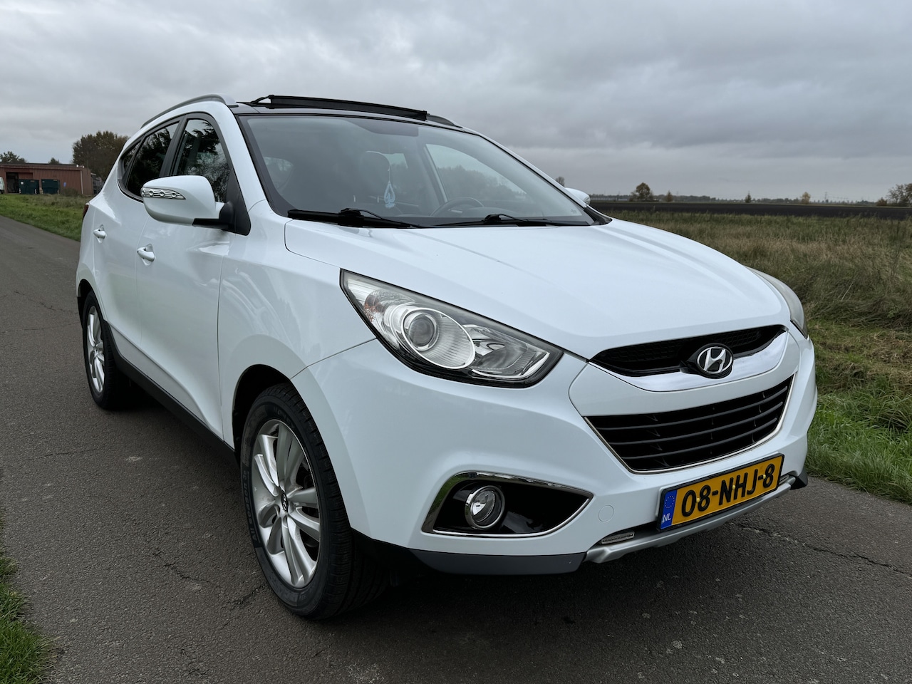 Hyundai ix35 - 2.0i i-Catcher NAVI/LEER/PANODAK/CRUISE/AUTOMAAT! - AutoWereld.nl