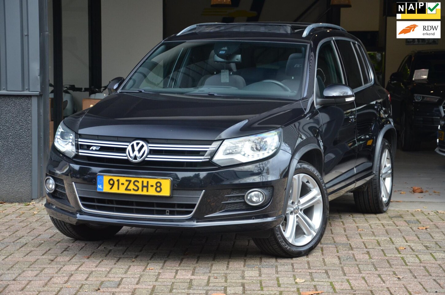 Volkswagen Tiguan - 1.4 TSI Sport&Style R-line - AutoWereld.nl