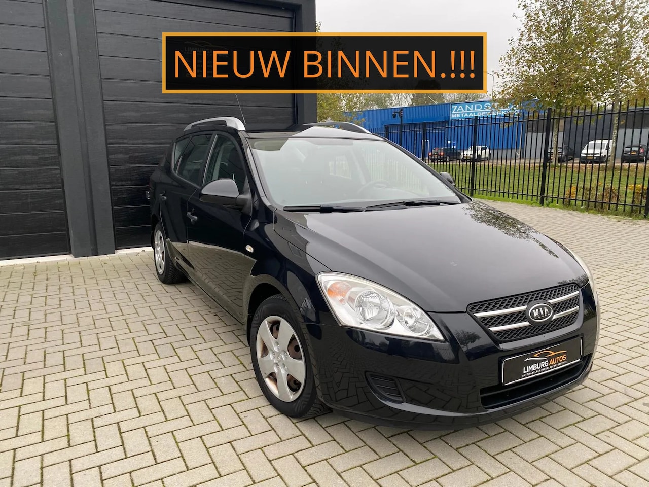 Kia Cee'd Sporty Wagon - 1.4 CVVT CLima - AutoWereld.nl