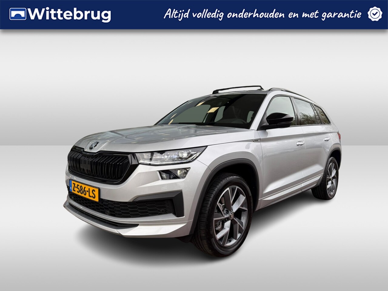 Skoda Kodiaq - 1.5 TSI Sportline Business 7p. / Panoramadak / Zwenkbare trekhaak / Fabrieksgarantie t/m 0 - AutoWereld.nl