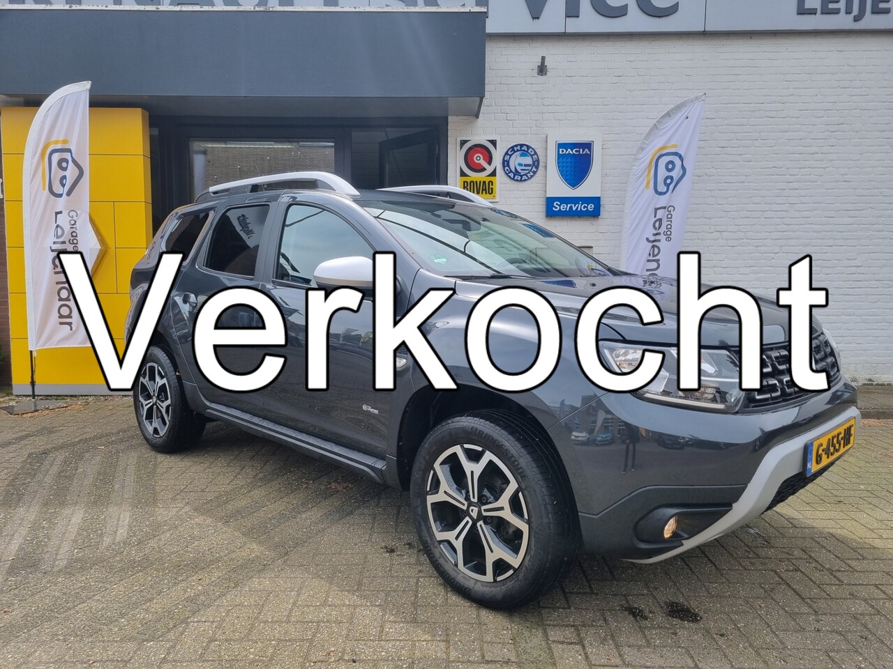 Dacia Duster - 1.3 TCe Prestige | Achteruitrijcamera | Navigatie | Airco | Lichtmetalen velgen - AutoWereld.nl