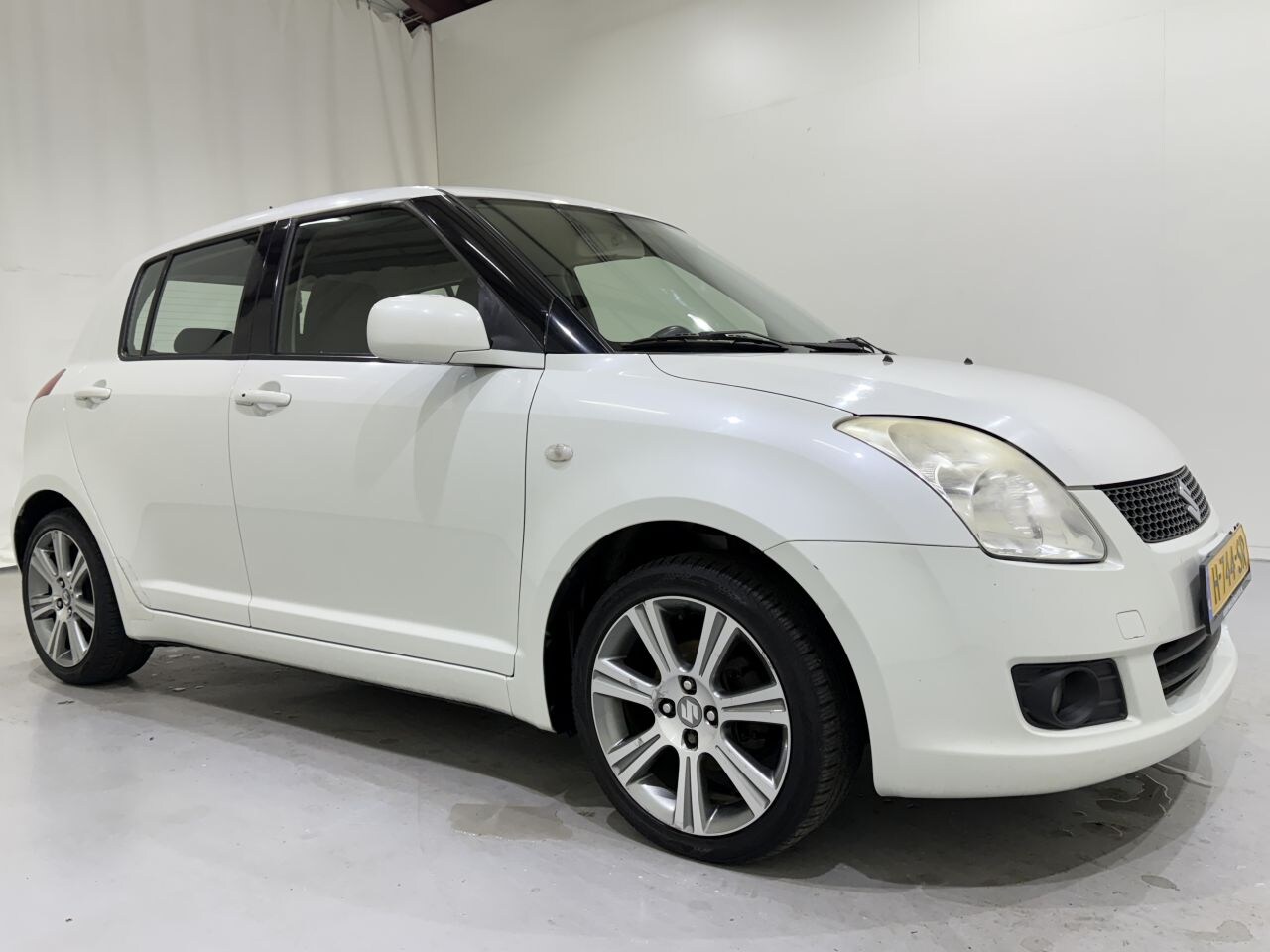 Suzuki Swift - HB 1.3 Cool Airco/Navi - AutoWereld.nl