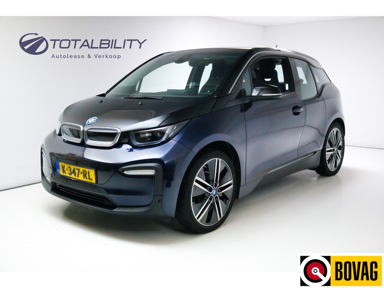 BMW i3 - Basis 120Ah 42 kWh 2000,- Subsidie mogelijk! Adap. Cruise, Stoelverwarming, Navigatie, Cam - AutoWereld.nl