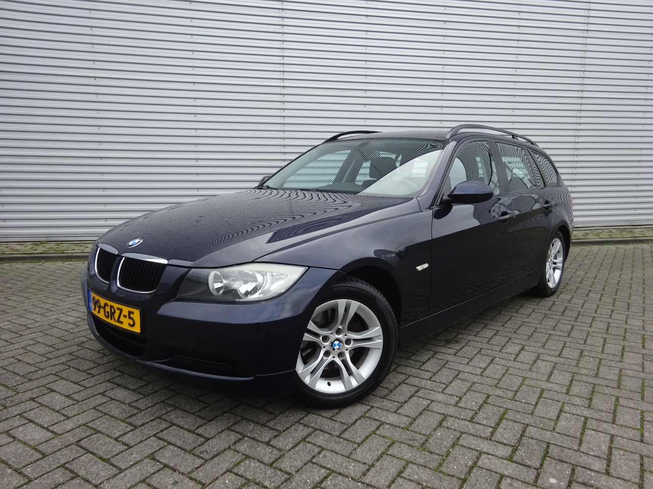 BMW 3-serie Touring - 318i Business Line Automaat / Navi / Trekhaak / Climaat / Cruise / Lm velgen - AutoWereld.nl