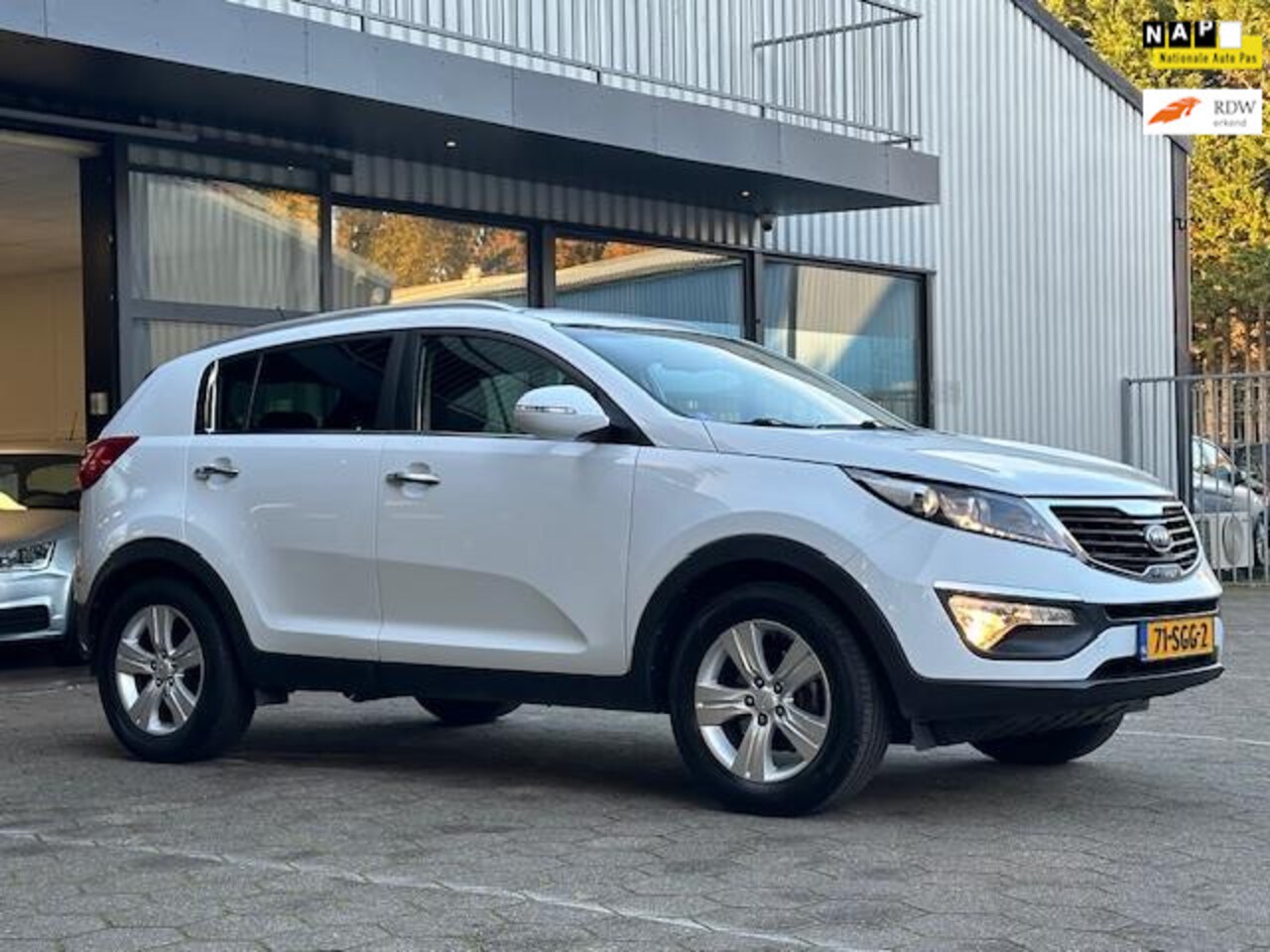 Kia Sportage - 2.0 X-ecutive Plus Pack / 2012 / PDC / Trekhaak - AutoWereld.nl