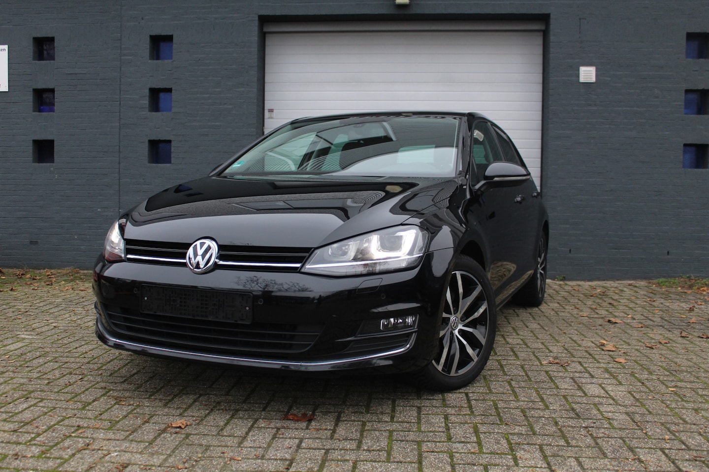 Volkswagen Golf - 1.4 TSI 122pk Highline|PDC|LED|NaviTrekhaak - AutoWereld.nl