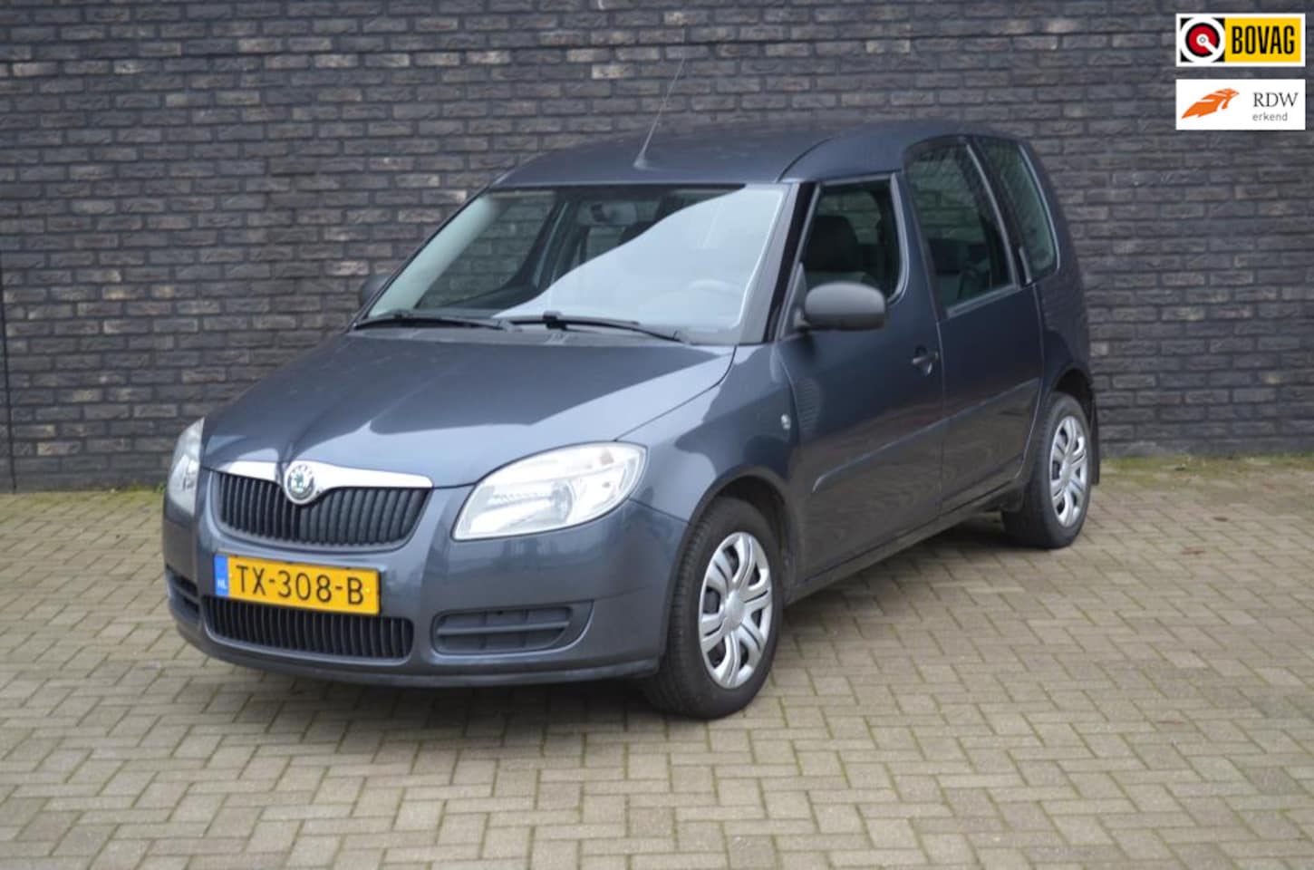 Skoda Roomster - 1.2 Go | Radio | Achterbank opklapbaar - AutoWereld.nl