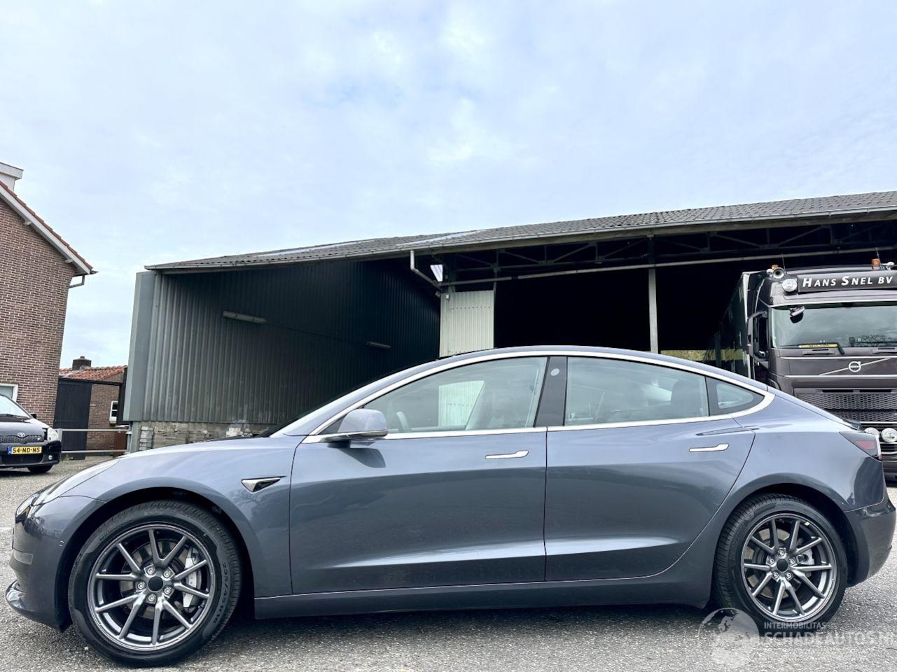 Tesla Model 3 - Long Range RWD Long Range AWD 75 kWh - AutoWereld.nl