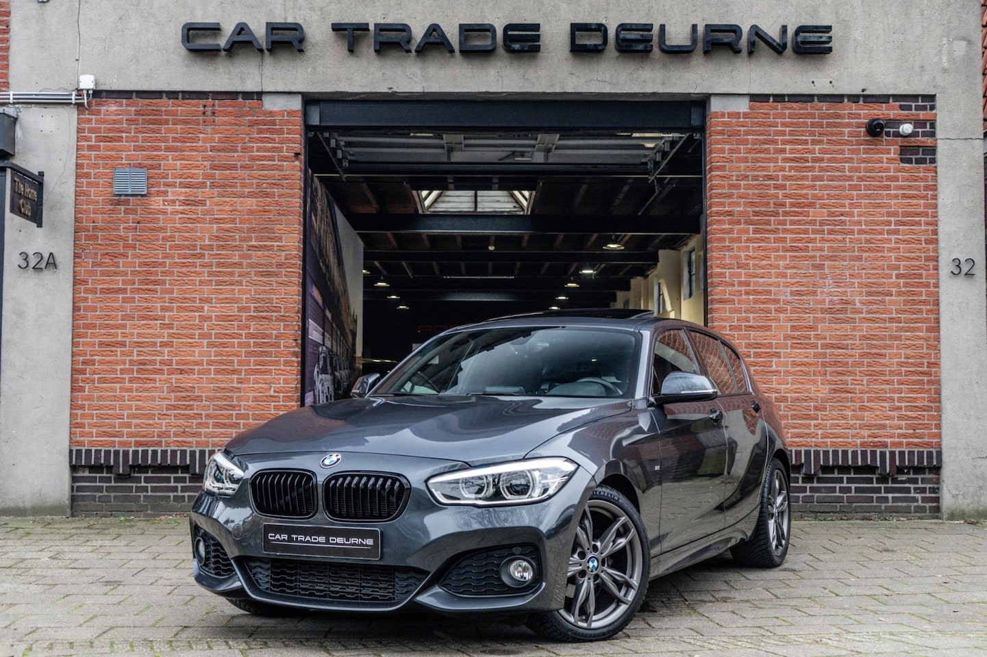 BMW 1-serie - 118i M Sport Pano / Navi / PDC - AutoWereld.nl