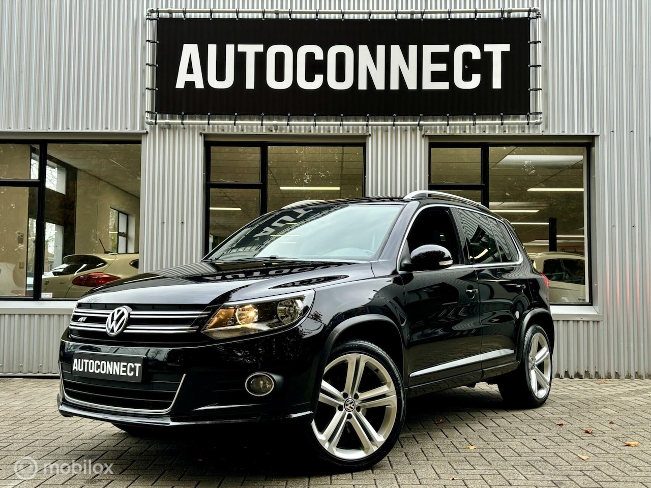 Volkswagen Tiguan - 1.4 TSI Sport&Style R-line Edition - AutoWereld.nl