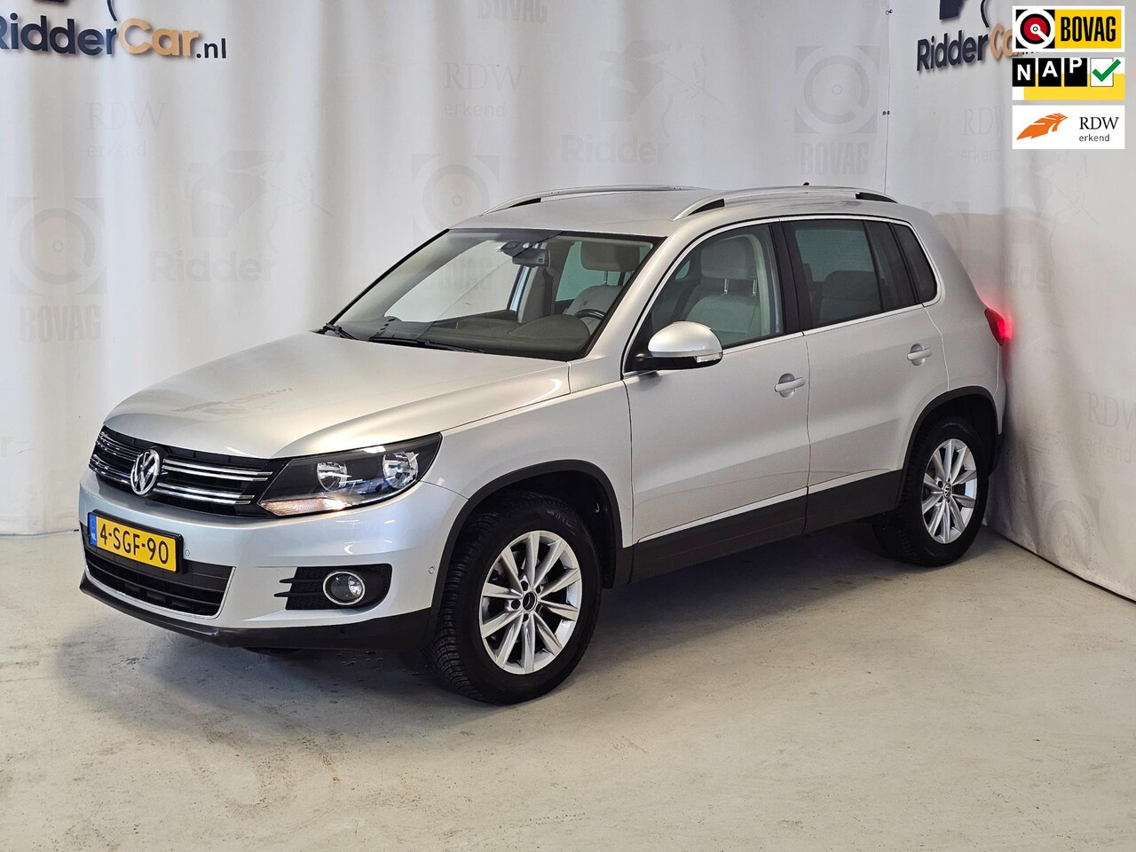 Volkswagen Tiguan - 1.4 TSI Sport&Style|GARANTIE|AUTOMAAT|NAP|1E EIG|LEDER|CRUISE|NAVI - AutoWereld.nl