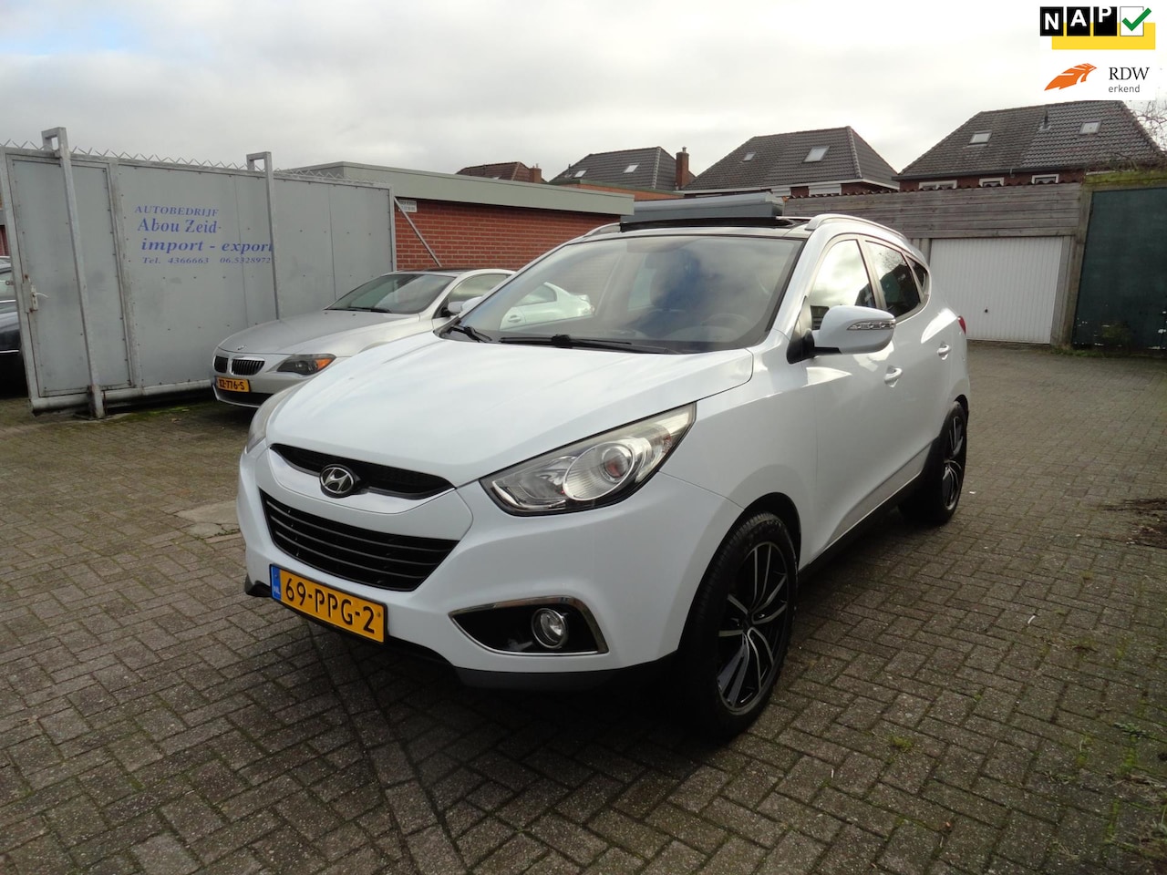 Hyundai ix35 - 2.0i i-Catcher Automaat | Panodak | Leder | Cruise Control - AutoWereld.nl