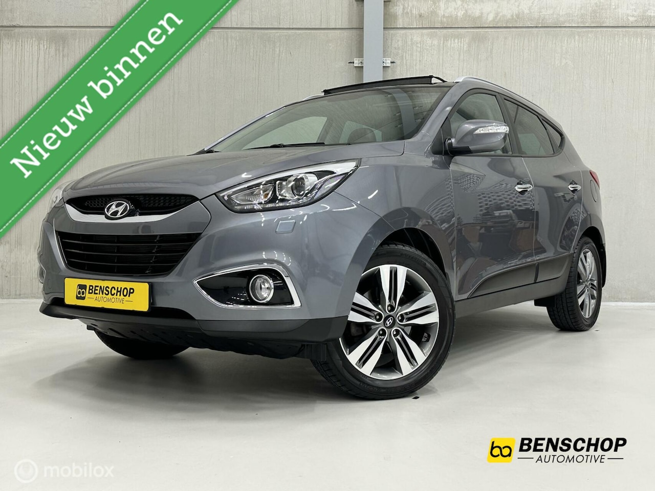 Hyundai ix35 - 2.0i i-Catcher 4WD AT Schuifdak Navi Leer Camera - AutoWereld.nl