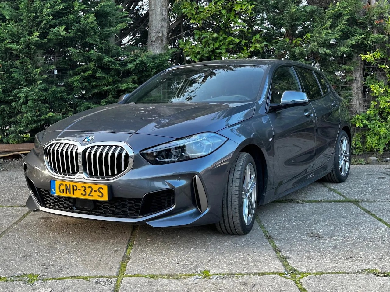 BMW 1-serie - 118i High Executive AUT M Sport Sfeerverl. Adaptive - AutoWereld.nl